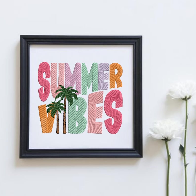 May include: A framed art print with the words "SUMMER VIBES" in colorful, textured letters. Two palm trees are between the words. The frame is black, and the background is white.