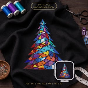 May include: A digital machine embroidery file featuring a stained-glass style Christmas tree design in vibrant multicolored geometric shapes stitched onto black fabric, accompanied by thread spools, scissors, pins, and a measuring tape.