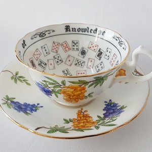 Aynsley Cup of Knowledge (With Instructions). Wisteria Pattern / Doris Cup. Longton, Stoke-on-Trent, Staffordshire. England