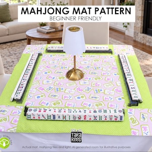 May include: A rectangular mahjong mat featuring a central pink panel with a repeating mahjong tile pattern, bordered by lime green polka-dot fabric. The mat includes four black tile racks and a small gold and white lamp. Text reads MAHJONG MAT PATTERN.