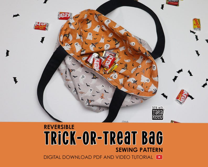 Reversible trick or treat bag opened to show interior lining filled with Halloween candy, handmade fabric tote sewing pattern.