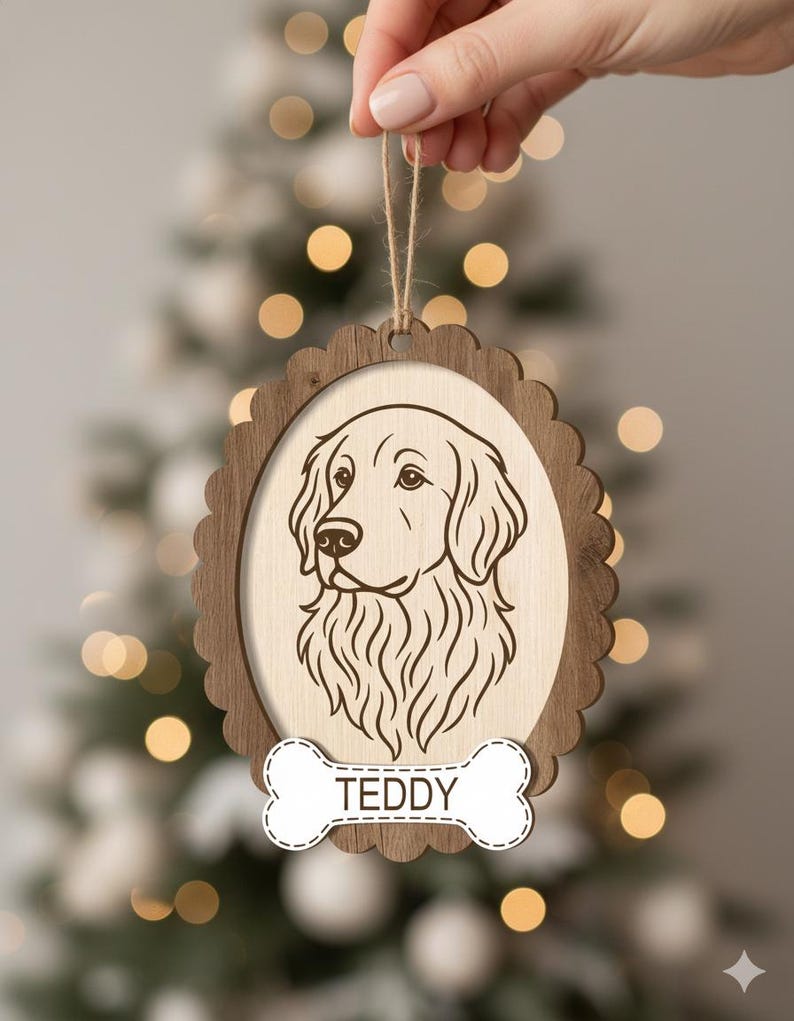 May include: Wooden dog ornament with a scalloped edge and a light brown frame. The ornament features a detailed line drawing of a dog's face within an oval. A bone-shaped tag below reads "TEDDY". A natural twine loop is attached for hanging.