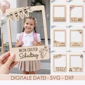 May include: A light-coloured wooden photo frame prop featuring laser-cut designs related to the first day of school, including text like 'MEIN ERSTER Schultag' and various school-themed icons such as cones, pencils, and stars for photography.