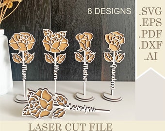 May include: Laser-cut wooden rose designs in various styles, including roses with the words "Mum", "Mom", "Mother", and "Grandma". The image also includes a rose with the words "love you". The text "8 Designs" and file type extensions are also visible.