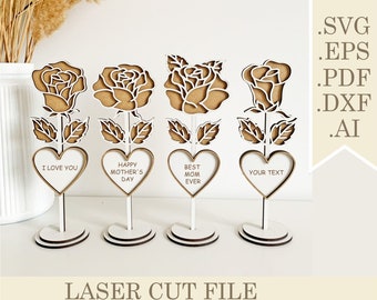 May include: Four laser cut wooden rose centerpieces with heart-shaped signs. The signs read "I love you", "Happy Mother's Day", "Best Mom Ever", and "Your Text".