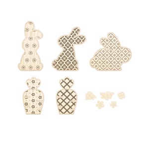 May include: A set of six wooden cutouts featuring a bunny rabbit and flower designs. The cutouts are decorated with a brown and white geometric pattern.