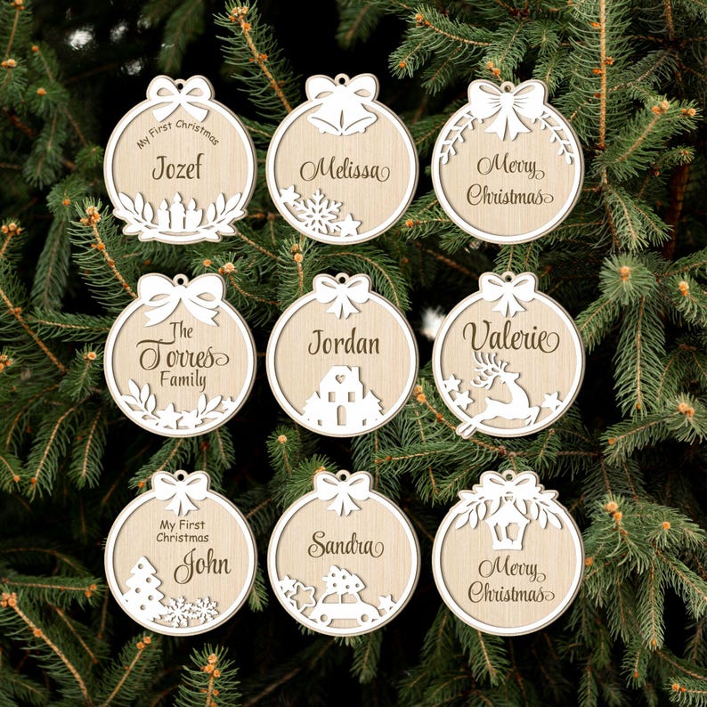 May include: Nine wooden Christmas baubles with various designs and names. The baubles feature a reindeer, a house, a car, a tree, bells, and a wreath. The names on the baubles include Jozef, Melissa, Merry Christmas, The Torres Family, Jordan, Valerie, John, Sandra, and Merry Christmas.