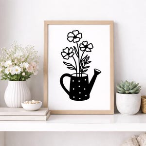 May include: A set of three ceramic mugs with a speckled, matte finish. The mugs are in shades of cream, light gray, and dark gray. Each mug has a simple, minimalist design and a rounded handle. Perfect for coffee or tea.