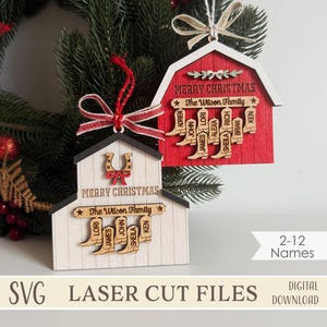 May include: Two wooden barn-shaped Christmas ornaments. One is red, the other is white. Both have "Merry Christmas" and "The Wilson Family" text. Each ornament features cowboy boot cutouts with names. The image also includes the text "SVG LASER CUT FILES" and "2-12 Names".