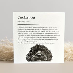 May include: A black and white illustration of a Cockapoo dog with the text "Cockapoo [kok-uh-poo] noun" and a description of the dog's personality traits.