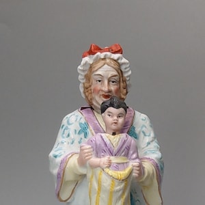Nodding head figurine Grany with Grandson double head German Bisque porcelain
