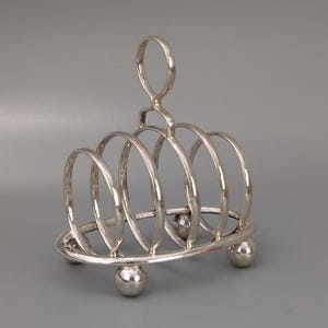 Antique Sterling silver Toast rack 4 slice by Walker & Hall 1931