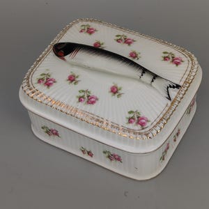 Antique porcelain sardine box with pink roses and fish handle