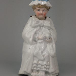 Antique Nodder figurine Knitter on chair Bisque porcelain