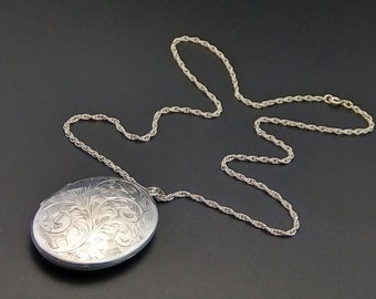 Large Sterling Silver oval Locket by Nathan Brothers