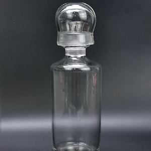 Chemistry oil dispenser bottle with spout and dome stopper