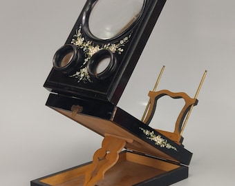 Grafoscopio antiguo plegable con visor óptico estereoscópico lacado en negro