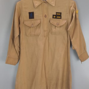 Vintage Girl Guides-jurk van Umbro c1960 maat 27 met Brownie-testkaart