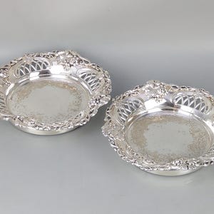 Antique pair of pierced bottle coasters grape and vine silver plated brass