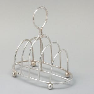 Antique Small wirework sterling silver Toast rack 4 slice by L Spiers 1886