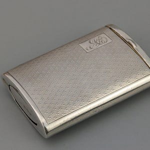 Slide match box case Sterling Silver engine turned with striker c1932