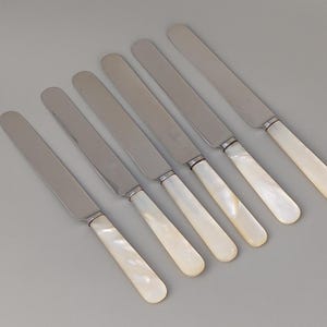 Mother & Pearl spreader knives by Barker Bross