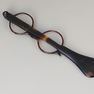 Antique Folding Lorgnette Glasses with a corrective lens