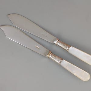 Pair Of Small Butter Knives With Mother & Pearl Handle