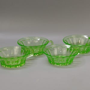 4 Uranium Glass Dessert cups with Daisy pattern