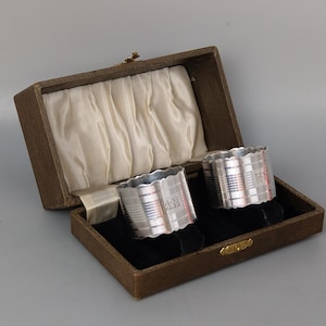 Pair of Antique Silver plated Monogrammed Napkin Rings set in original box A.M & R.M