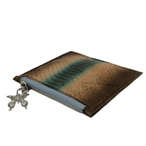 Exotic leather wallet with capacity for cards and bills. PURSE Stripes, snakeskin coin purse, zipper closure.