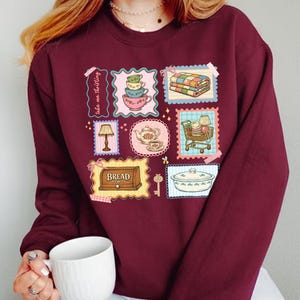 May include: A rustic wooden sign with the text "Welcome to our home" in white lettering. The sign features a distressed finish and a simple, inviting design, perfect for front door decor.