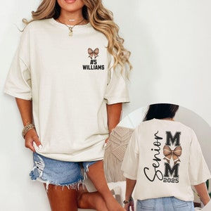 Custom Senior 2025 Football Coquette Comfort Colors Shirt, Personalized Name and Number, Class of 2025 Proud Senior Mom Game Day Gift