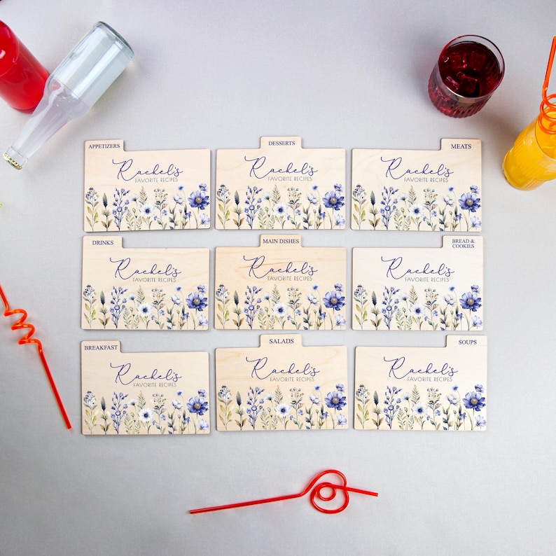 May include: Nine wooden recipe card dividers with a floral design and the text "Rachel's Favorite Recipes" on each divider. The dividers are labeled with categories such as appetizers, desserts, meats, drinks, main dishes, salads, soups, breakfast, and bread & cookies.