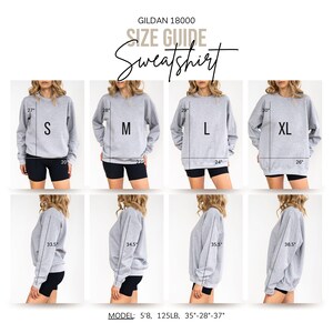 May include: A size guide for a grey Gildan 18000 sweatshirt. The guide shows the measurements for sizes S, M, L, and XL. The model is 173 cm tall and weighs 57 kg. The text "SIZE GUIDE Sweatshirt" is at the top.