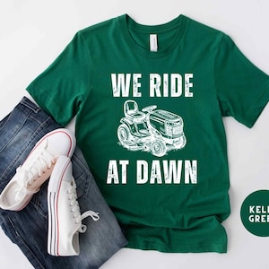 We ride at dawn, Funny Lawn Mowing Dad Shirt, Father’s Day Gift Idea, Dad Joke T-Shirt, Gift for Dad, Yard Work Humor T-Shirt for Dad