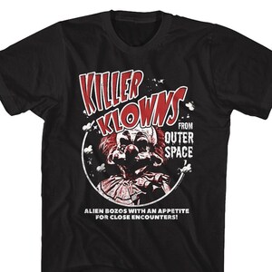 May include: Black t-shirt with a red and white graphic of a clown with the text "Killer Klowns from Outer Space. Alien Bozos with an appetite for close encounters!"
