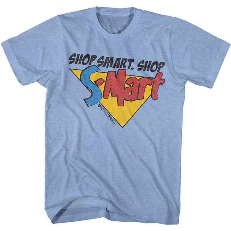 May include: A light blue t-shirt with a yellow, red, and blue logo that says "Shop Smart. Shop S-Mart.  Aisle of Darkness."