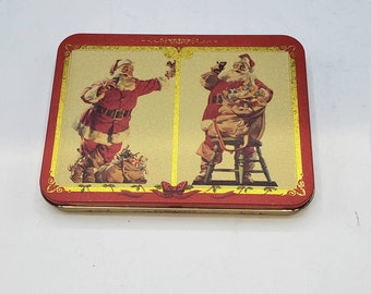 1994 Coca Cola Collectors Tin with 2 new wrapped playing cards, Santa drinking a Cola