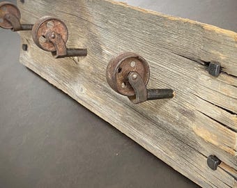 Reclaimed Barnwood Rack with 3 Antique Caster Wheel Hooks | Rustic Farmhouse Decor