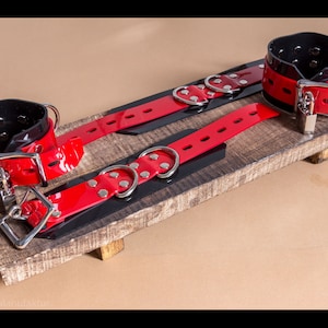 Hand and ankle cuffs made of colored PVC lockable bondage set latex cuffs