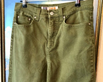 green faded jeans