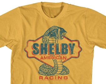 Camisetas doradas con el logotipo de Shelby American Racing Cobra