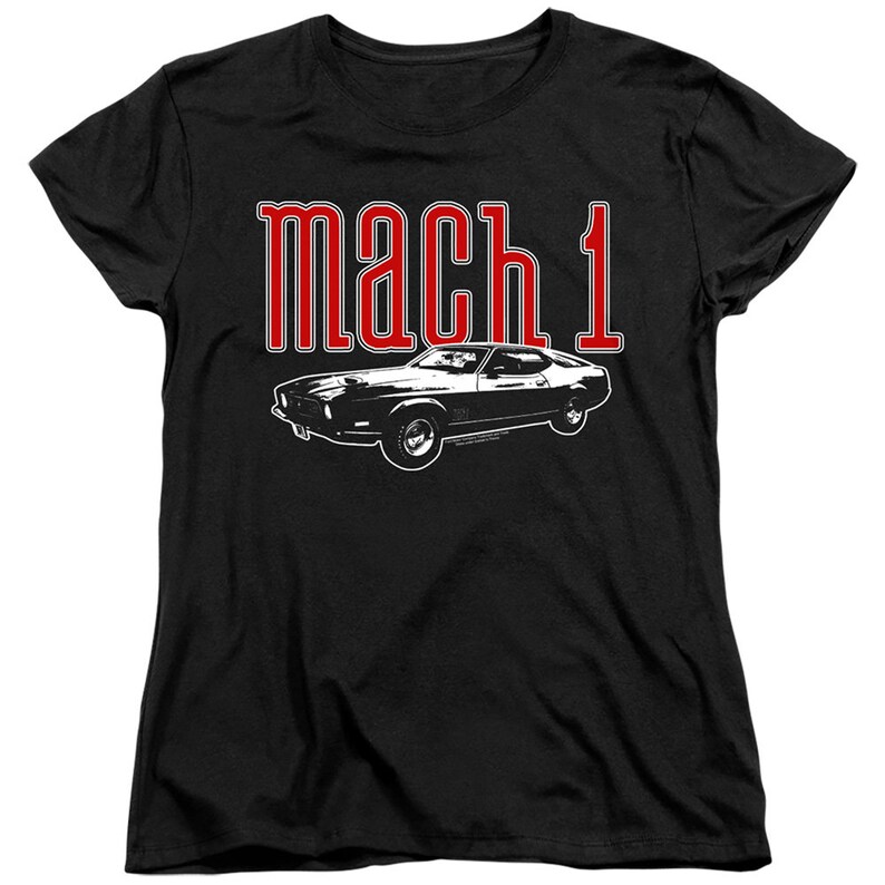 May include: Black t-shirt with a white silhouette of a classic car and the text "mach 1" in red.