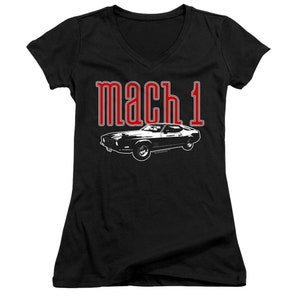 May include: Black v-neck t-shirt with a white silhouette of a classic car and the text "mach 1" in red.
