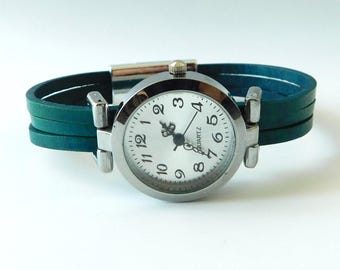 Women's watch. Custom size; turquoise leather band; magnetic closure.
