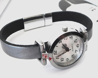 Women's wristwatch, custom-sized leather band, magnetic clasp.