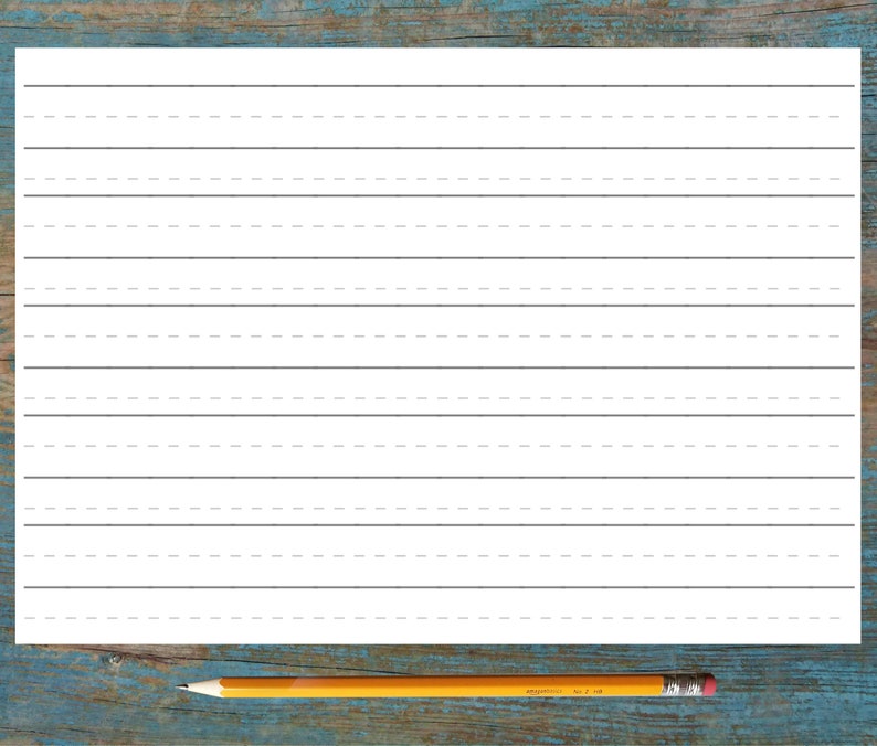 May include: A blank white sheet of paper with lined writing paper, a yellow pencil is lying on a blue wooden surface.