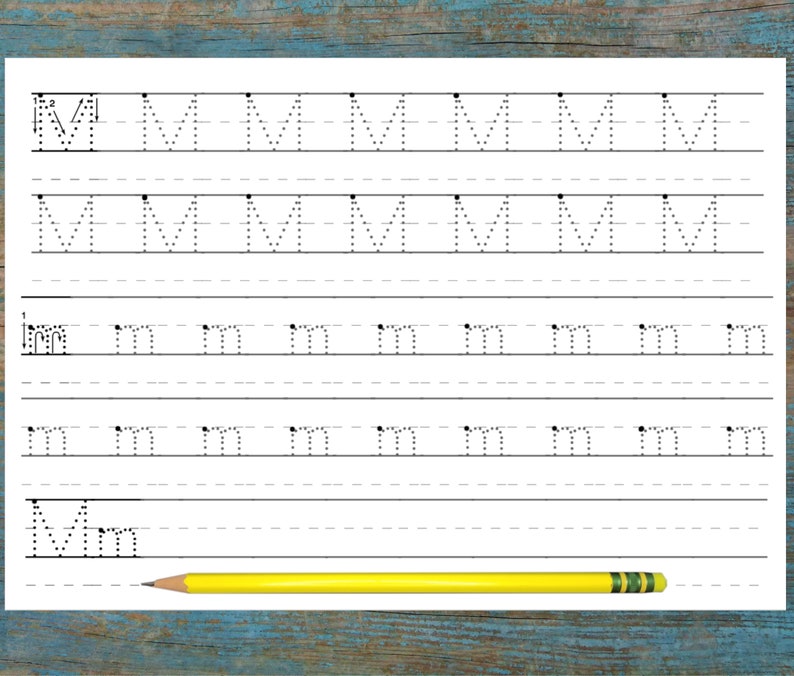 Capital and lowercase letter 'M' in dotted lines for focused tracing practice.