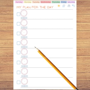 May include: A printable daily planner with a checklist and clock icons. The planner has the title "MY PLAN FOR THE DAY" and includes days of the week at the top.
